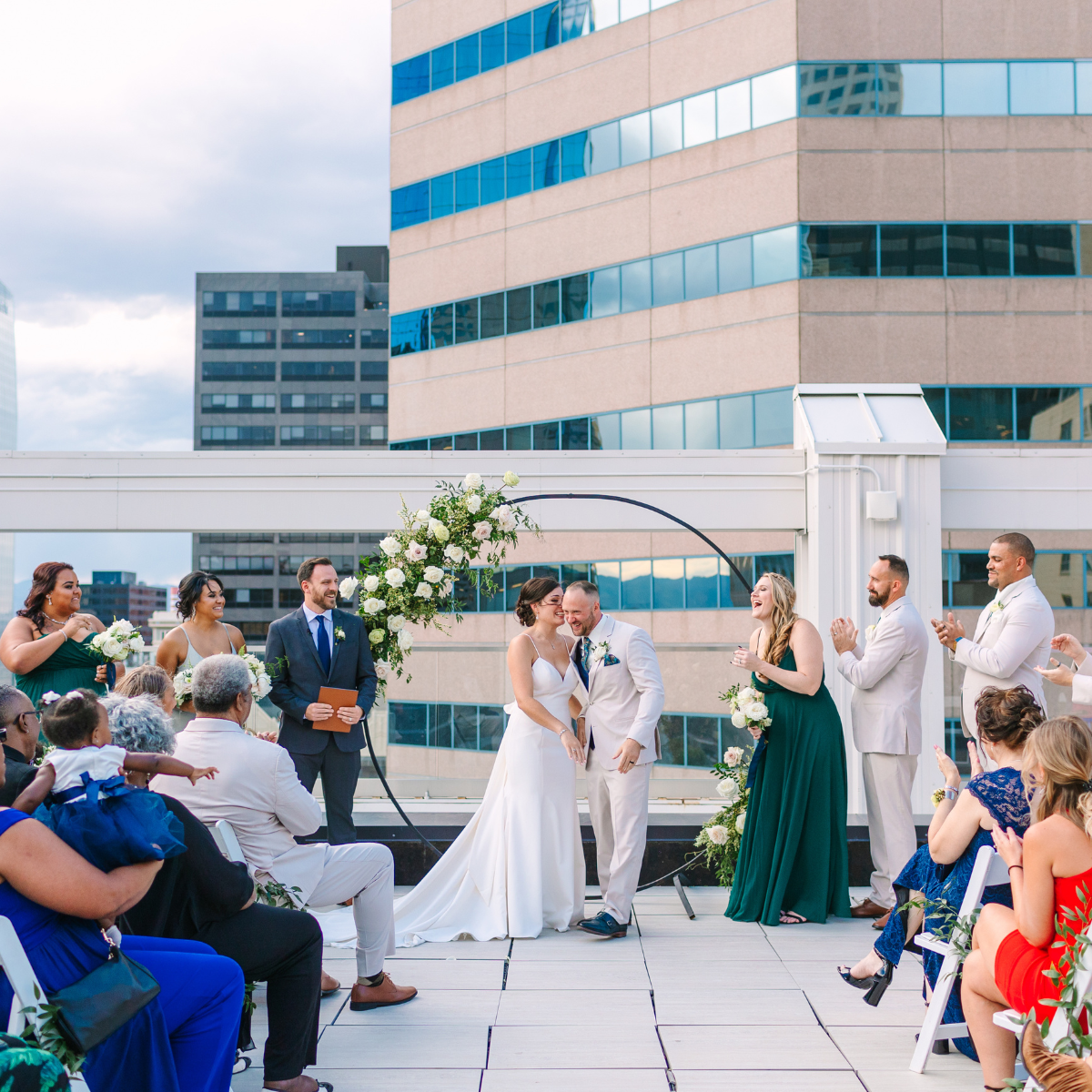 Outdoor wedding ceremony with skyline views at Rooftop1630 in Denver